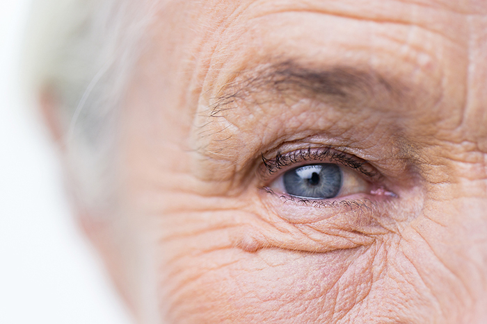 Age, Vision And Old People Concept - Close Up Of Senior Woman Face And Eye